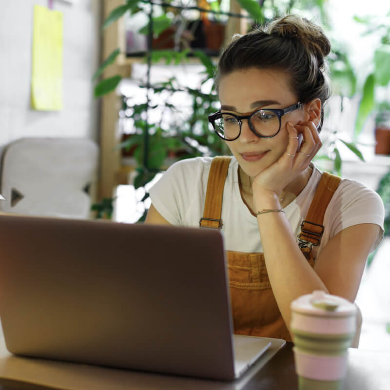woman sitting at laptop