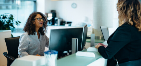 swim instructor and student during swim lessons in pool