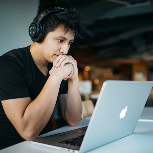 man watching webinar replay of family communication